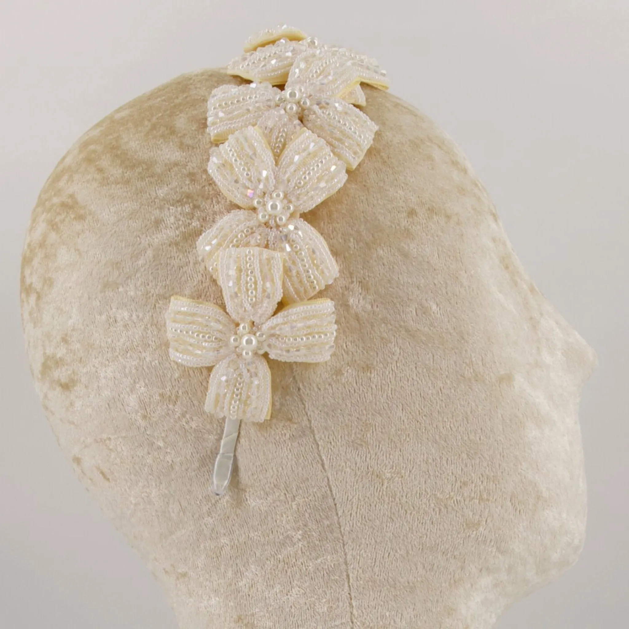 The Sariel Statement Cream Bow Headband