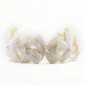 The Sariel Statement Cream Bow Headband
